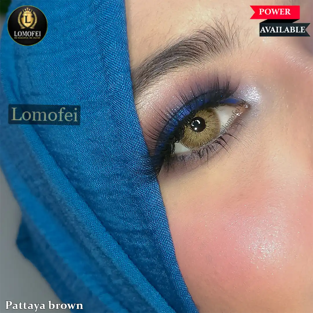 A model wearing Ksseye Pattaya Brown Fashion Colour Eye Lenses, close-up view of the eye with high definition.
