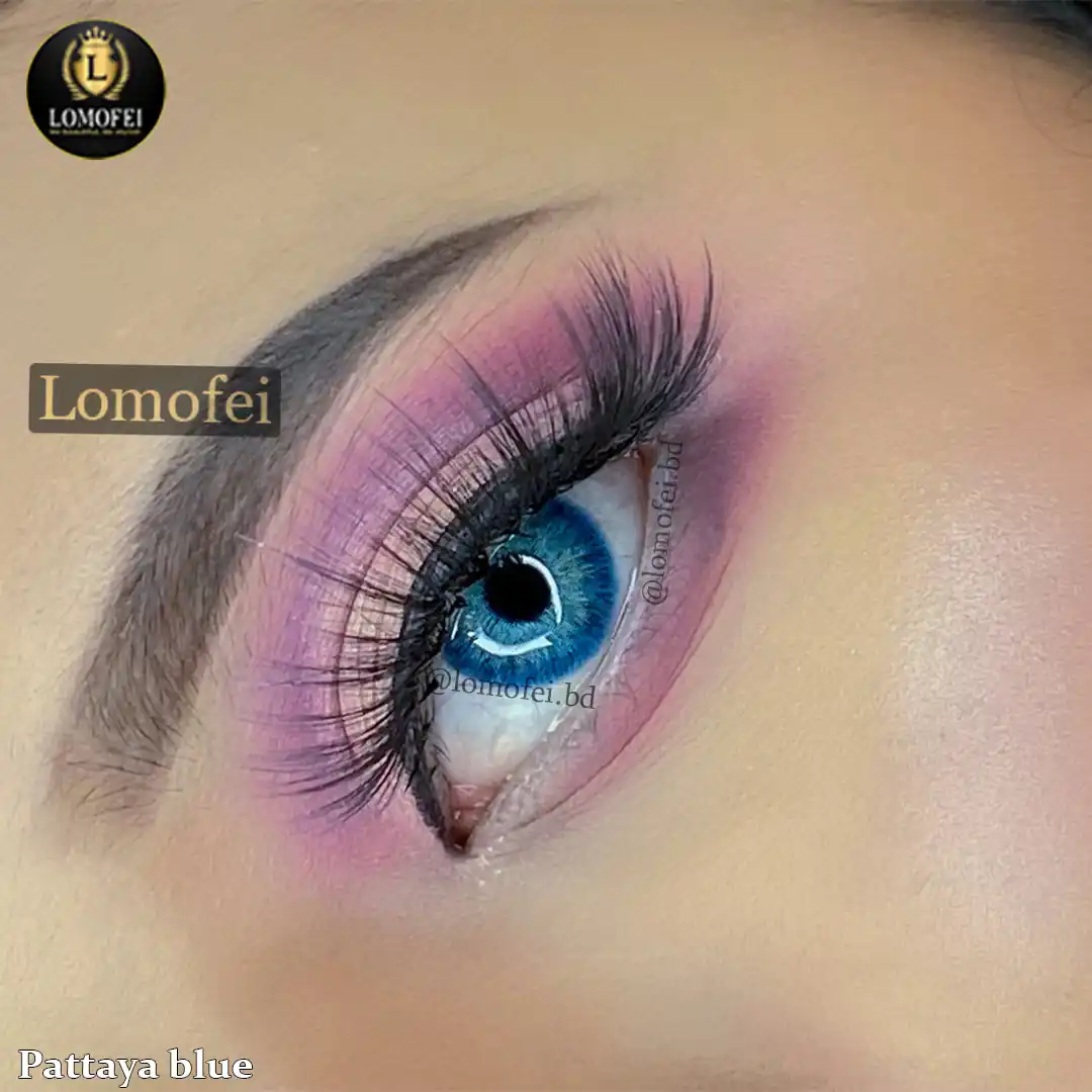 A model wearing Ksseye Pattaya Blue Fashion Colour Eye Contact Lenses, close-up view of the eye with high definition.