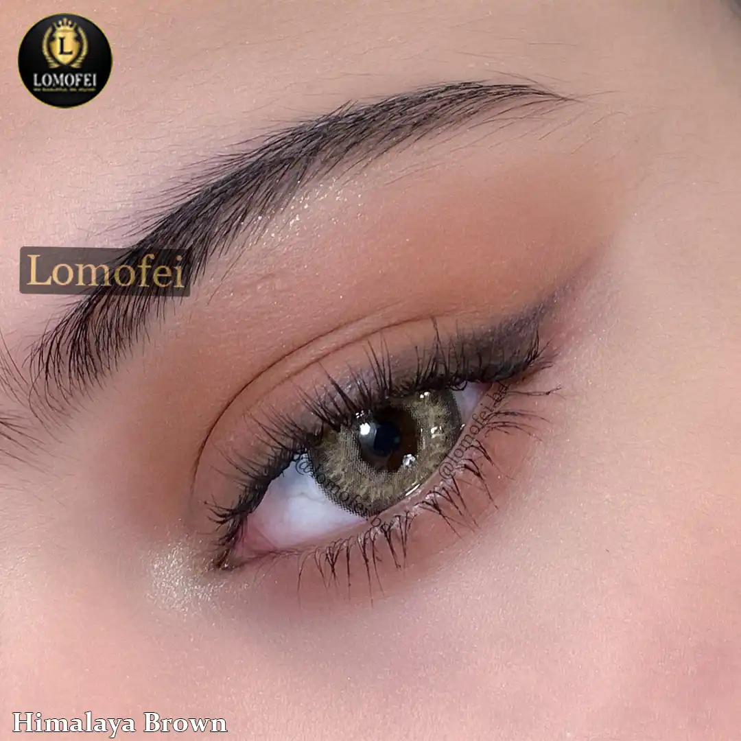 A model wearing Ksseye Himalaya Brown Color Contact Lenses, close-up view of the eye with high definition.