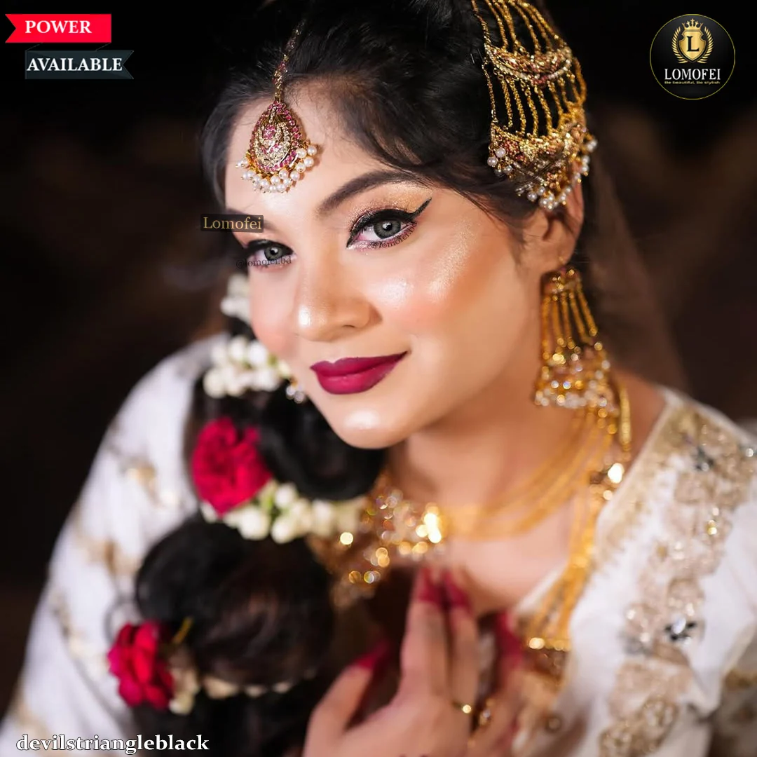 Model wearing Freshlady Devil's Triangle Black power lenses with heavy bridal eye makeup